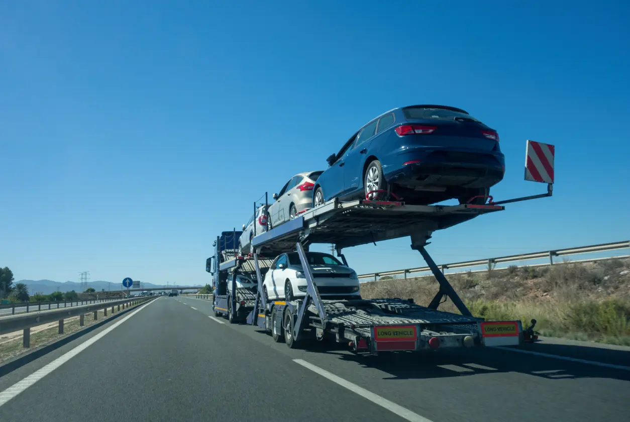 New Project (3) Car transporter truck on highway road.