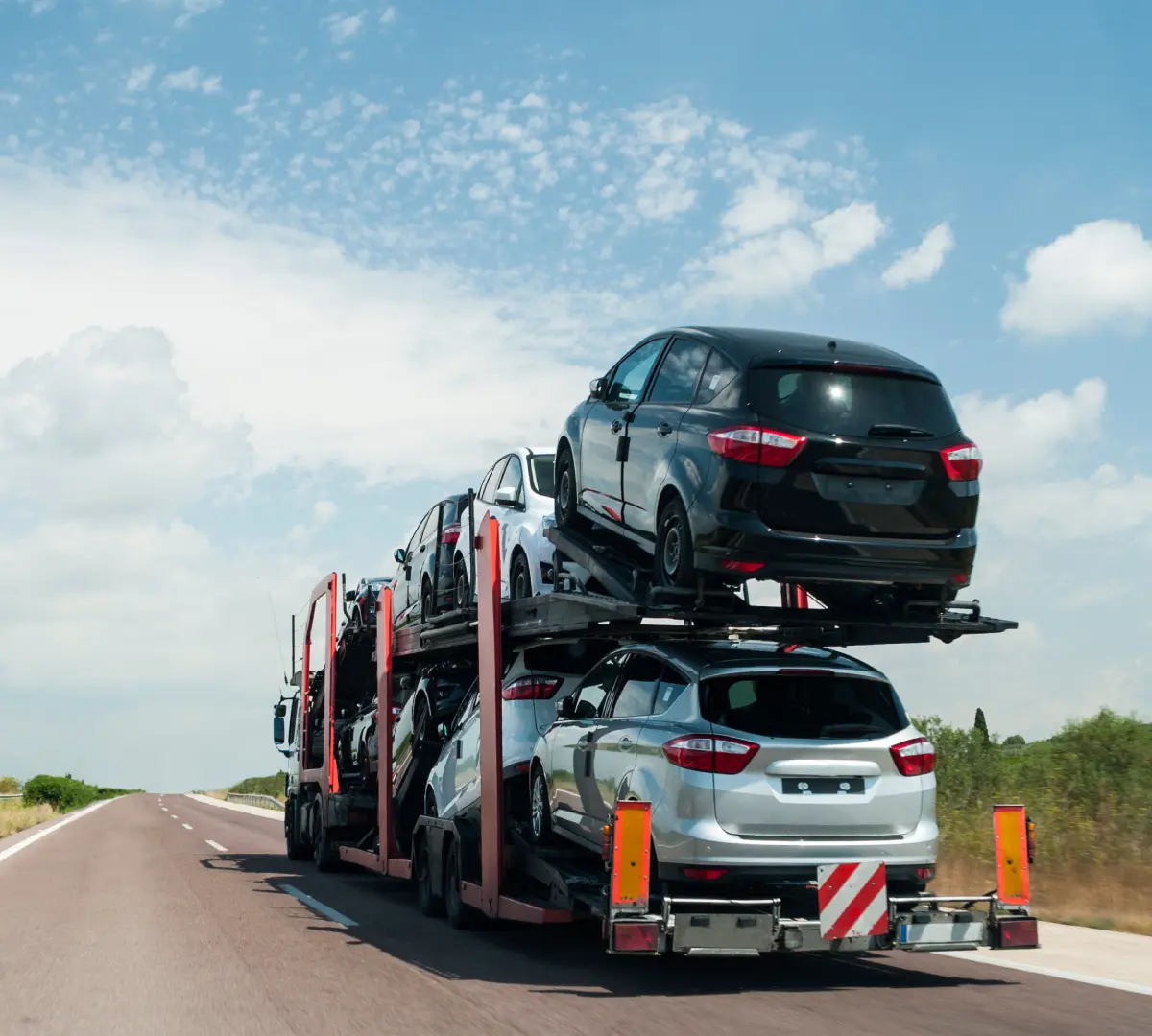 New Project(16) Car carrier truck on open highway.